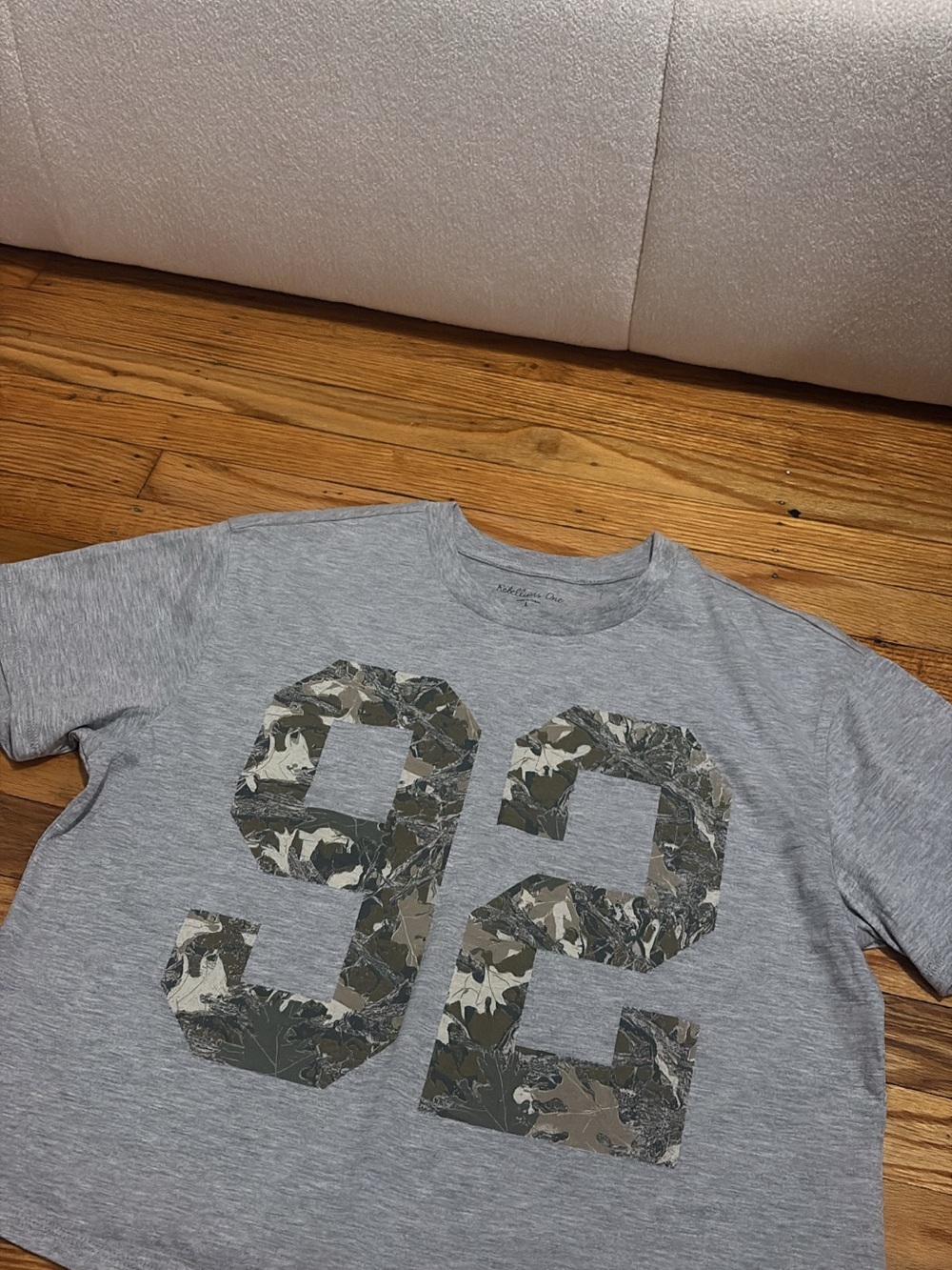 Rebellious One Gray Crop Top with Camouflage '92' Graphic